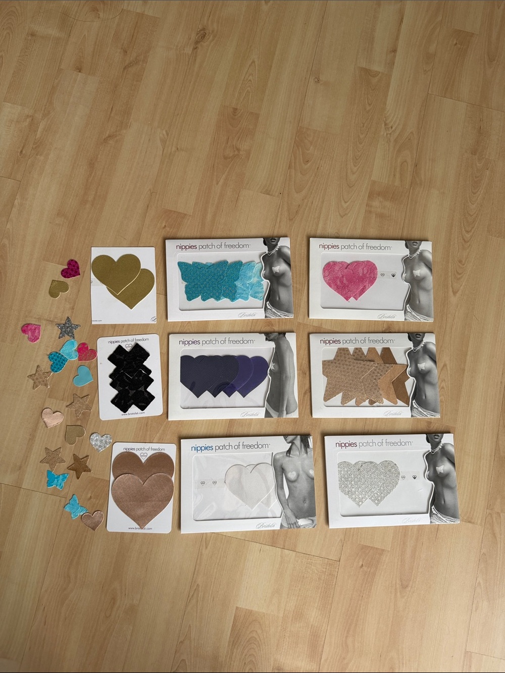 Set of 12 Pairs of Nippies Parch Of Freedom Nipple Covers - assorted colors